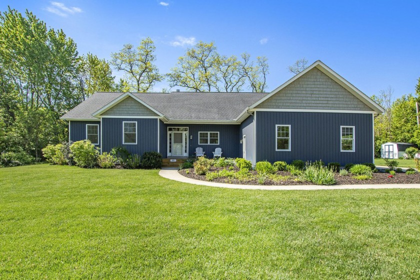 Discover refined lakeshore living in Mount Pleasant, a private - Beach Home for sale in South Haven, Michigan on Beachhouse.com