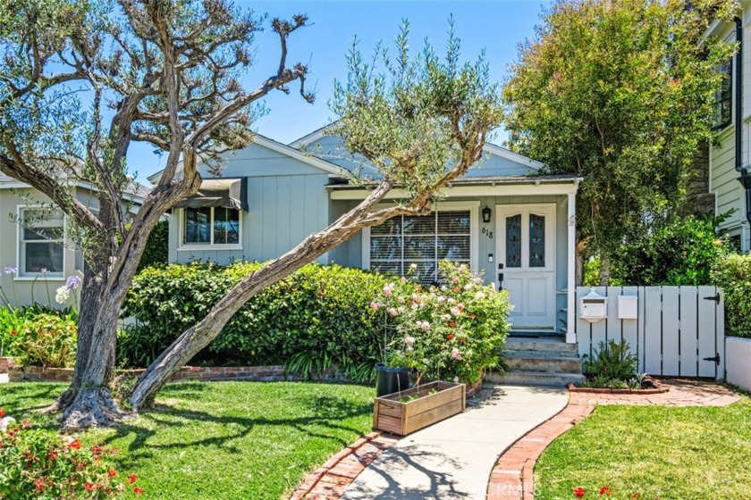 Nestled in Corona del Mar's coveted Flower Streets, this - Beach Townhome/Townhouse for sale in Corona Del Mar, California on Beachhouse.com