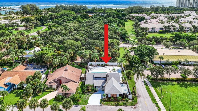 WOW!! One of a handful of single family homes nestled in this - Beach Home for sale in Jupiter, Florida on Beachhouse.com