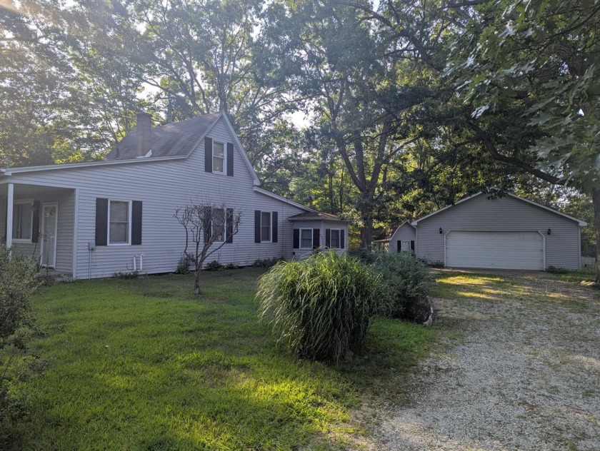 Discover this charming 1.18-acre property, ideally situated just - Beach Home for sale in Michigan City, Indiana on Beachhouse.com