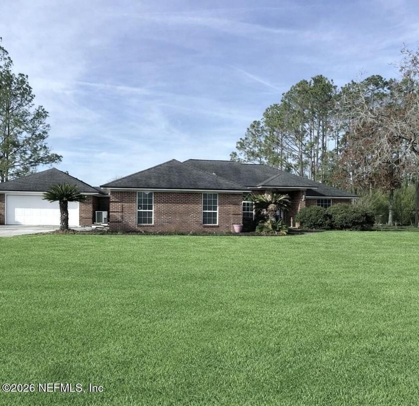 Beautiful 4-bedroom, 2-bath brick lakefront home on a spring-fed - Beach Home for sale in Middleburg, Florida on Beachhouse.com