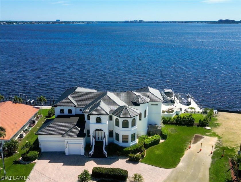 Prestigious 2-story home with 170FT of seawall located on the - Beach Home for sale in Cape Coral, Florida on Beachhouse.com