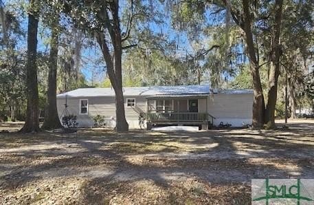 Charming property at Lake George, featuring a 1,820-square-foot - Beach Home for sale in Midway, Georgia on Beachhouse.com
