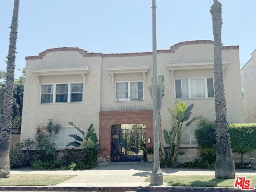 This two-story, townhome style condo located in *The Hamilton* - Beach Condo for sale in Long Beach, California on Beachhouse.com