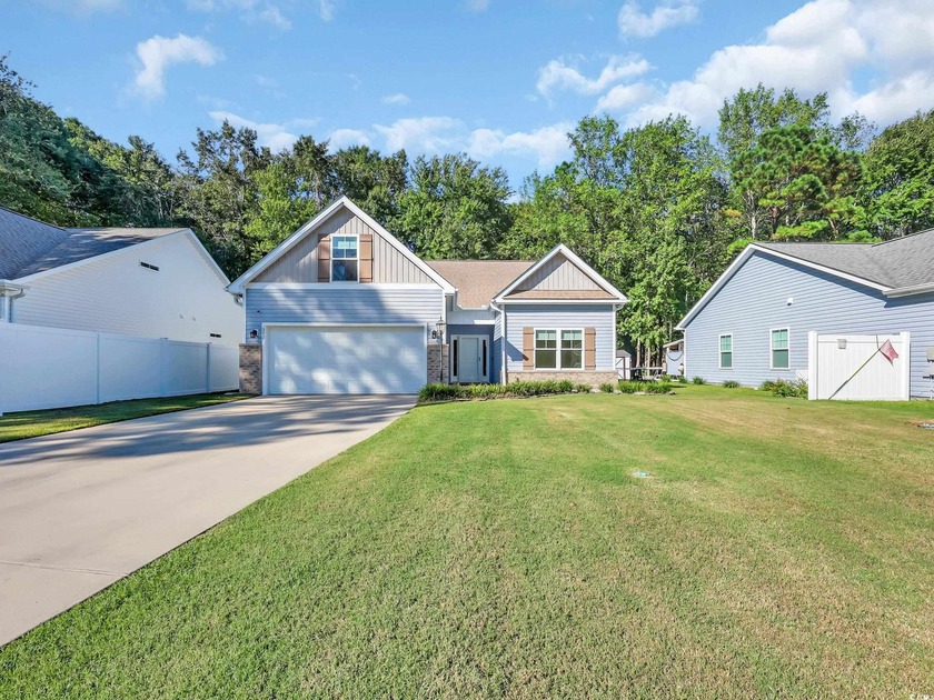 Embrace the coastal lifestyle with easy golf cart access to the - Beach Home for sale in Pawleys Island, South Carolina on Beachhouse.com