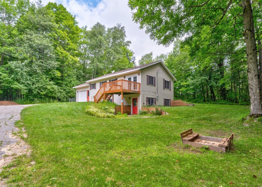 Discover your new retreat! Tucked away on a private, wooded lot - Beach Home for sale in Mcmillan, Michigan on Beachhouse.com