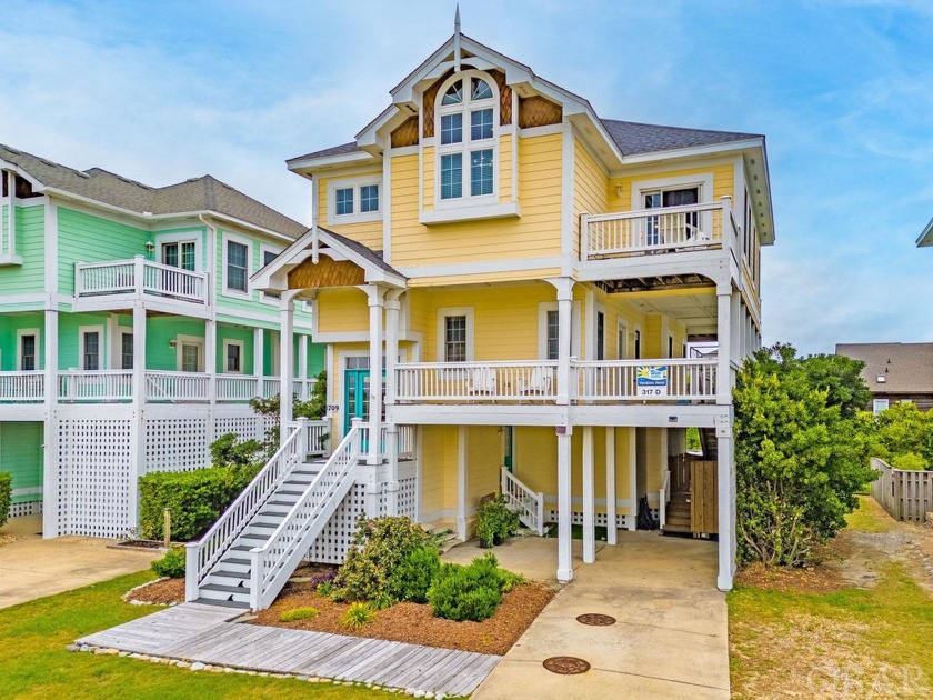 This luxurious four-bedroom home, featuring four full baths and - Beach Home for sale in Kill Devil Hills, North Carolina on Beachhouse.com