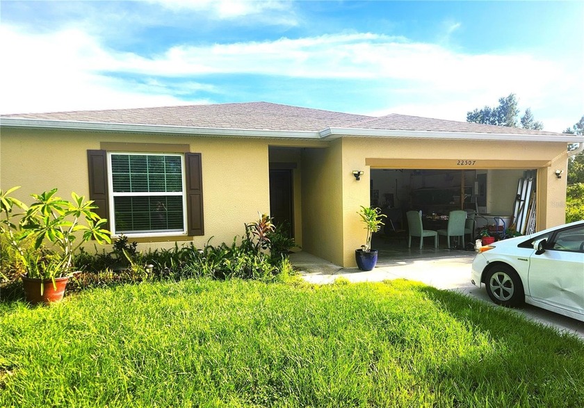 This modern four-bedroom, two-bathroom home offers a comfortable - Beach Home for sale in Port Charlotte, Florida on Beachhouse.com