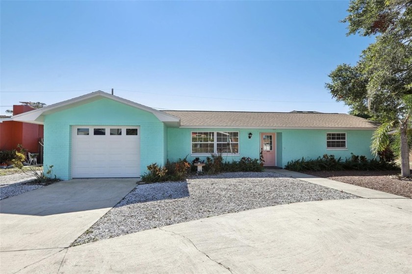 Just a short walk from Sunset Beach Park, this beautifully - Beach Home for sale in Tarpon Springs, Florida on Beachhouse.com