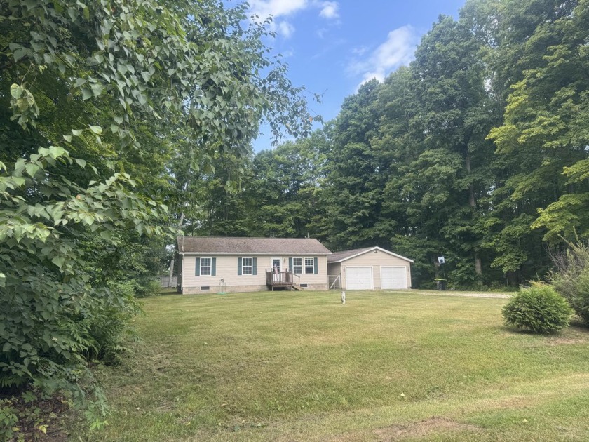 This charming 3-bedroom, 1-bathroom home is nestled in the - Beach Home for sale in Mcmillan, Michigan on Beachhouse.com