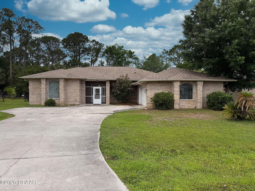 Brick pool home offering over 2,000 sq ft with 3 bedrooms and 3 - Beach Home for sale in Palm Coast, Florida on Beachhouse.com