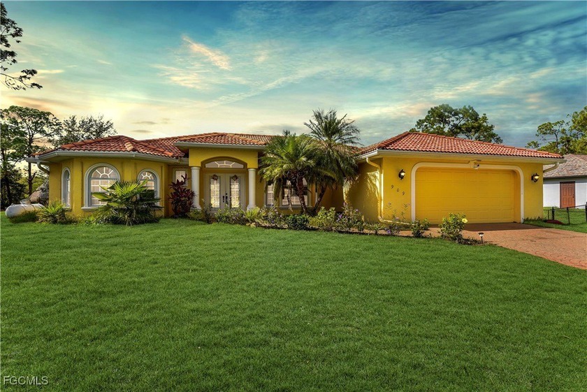 MAGNIFICENT 4 BED / 2 BATH | 2,400+ SQ FT | GAS-HEATED SALTWATER - Beach Home for sale in Lehigh Acres, Florida on Beachhouse.com