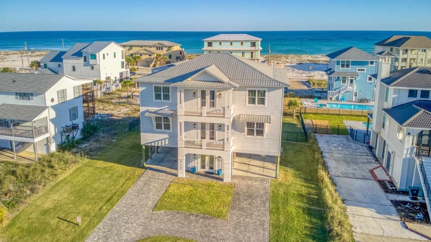 Located one block from the white sands of Pensacola Beach, this - Beach Home for sale in Pensacola Beach, Florida on Beachhouse.com