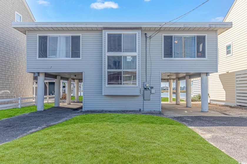 Experience the best of Cherry Grove in this charming raised - Beach Home for sale in North Myrtle Beach, South Carolina on Beachhouse.com