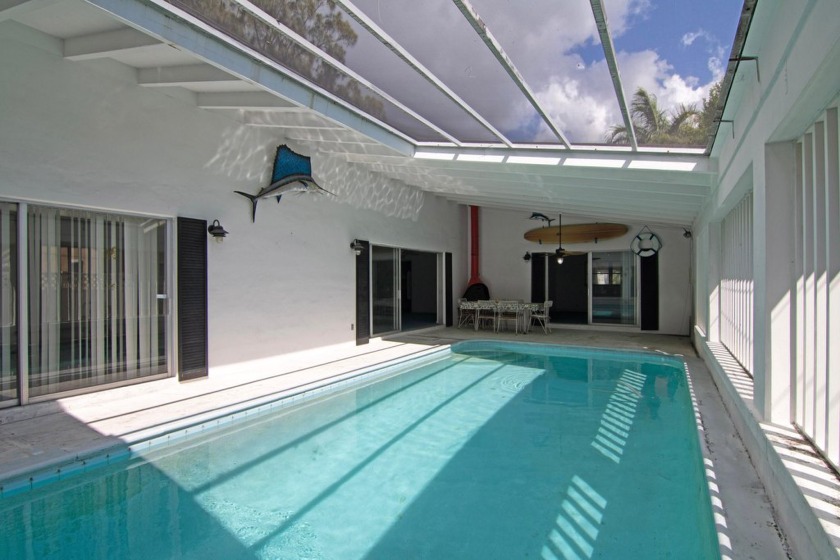 This Pool Home has 3 Bedrooms, Office, 2 Full Baths and a 1 car - Beach Home for sale in Boynton Beach, Florida on Beachhouse.com