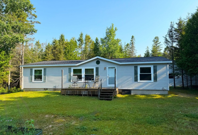 This 3 bedroom, 2 bath home is quietly tucked away in the woods - Beach Home for sale in Cedarville, Michigan on Beachhouse.com