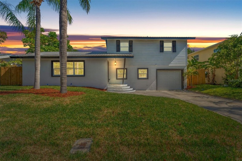 This meticulously updated and remodeled home offers a blend of - Beach Home for sale in Tampa, Florida on Beachhouse.com