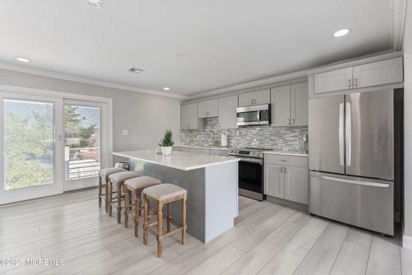 Discover this fully renovated duplex on Pelican Island in - Beach Home for sale in Seaside Heights, New Jersey on Beachhouse.com