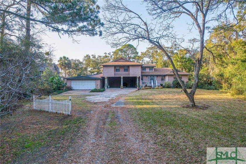 Charming Tybee Island home w/creek & Marsh views nestled on a - Beach Home for sale in Tybee Island, Georgia on Beachhouse.com