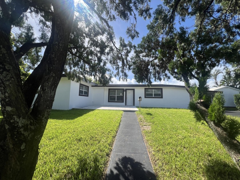 Welcome to this spacious single-family home that offers 2,465 - Beach Home for sale in Lake Worth Beach, Florida on Beachhouse.com