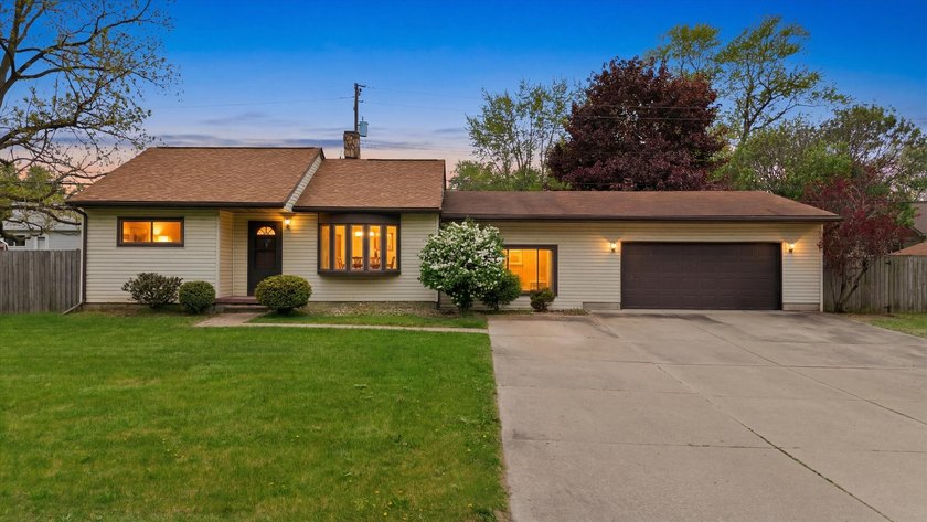 Charming 3-bedroom, 1-bath ranch home situated on a rare double - Beach Home for sale in Monroe, Michigan on Beachhouse.com