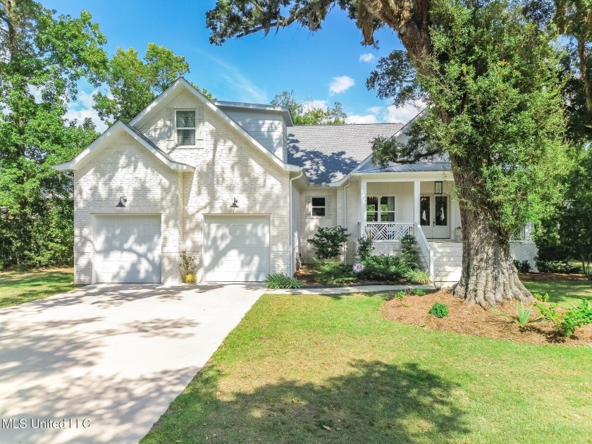 Enjoy cool breezes off the water as you relax on the spacious - Beach Home for sale in Biloxi, Mississippi on Beachhouse.com