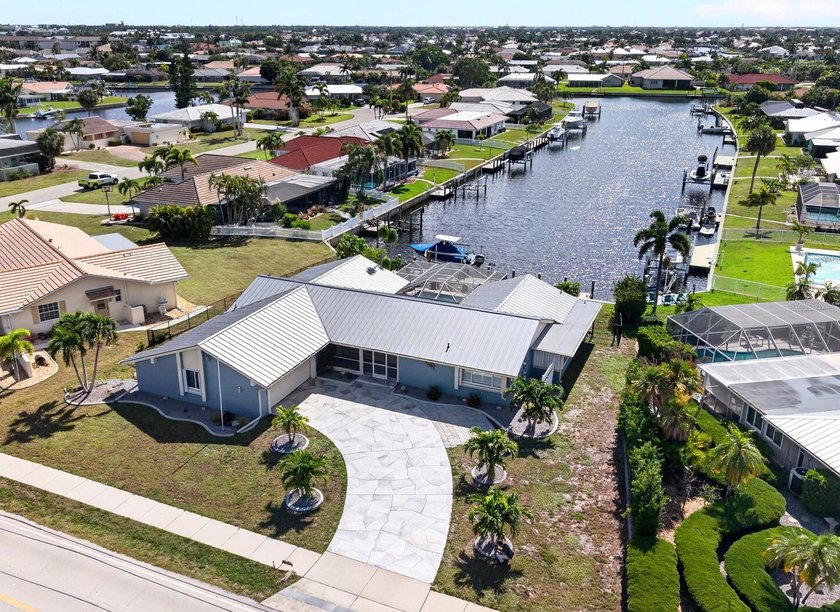 Punta Gorda Isles Waterfront Pool Home with Gulf Access! Located - Beach Home for sale in Punta Gorda, Florida on Beachhouse.com