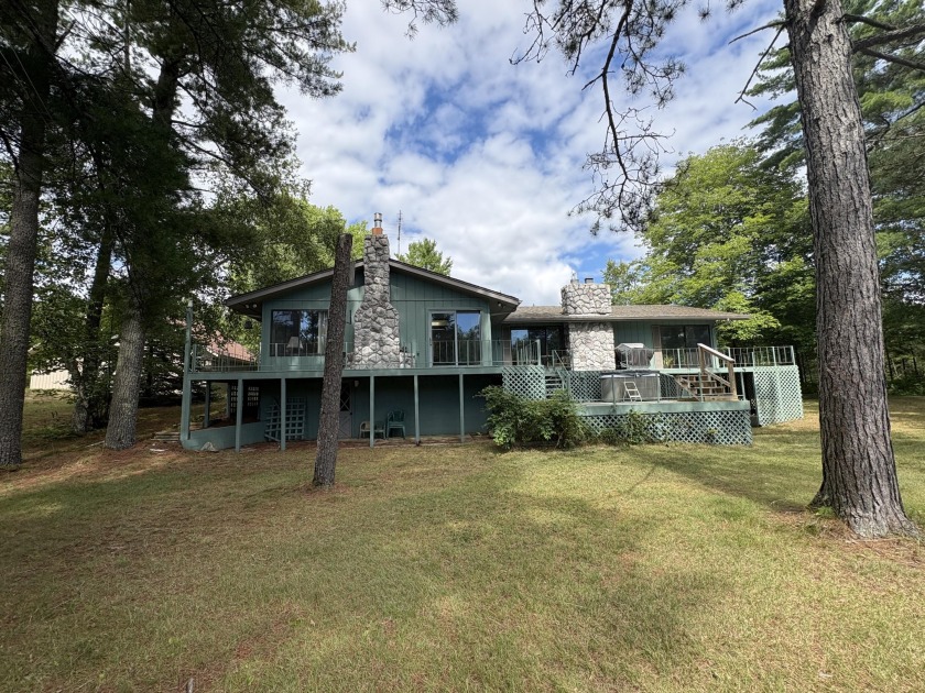 Welcome to your tranquil retreat at W12361 East River Rd - Beach Home for sale in Naubinway, Michigan on Beachhouse.com