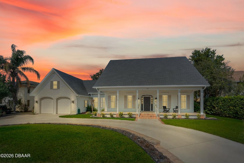 Located on the highly sought-after Sugar Mill Country Club golf - Beach Home for sale in New Smyrna Beach, Florida on Beachhouse.com