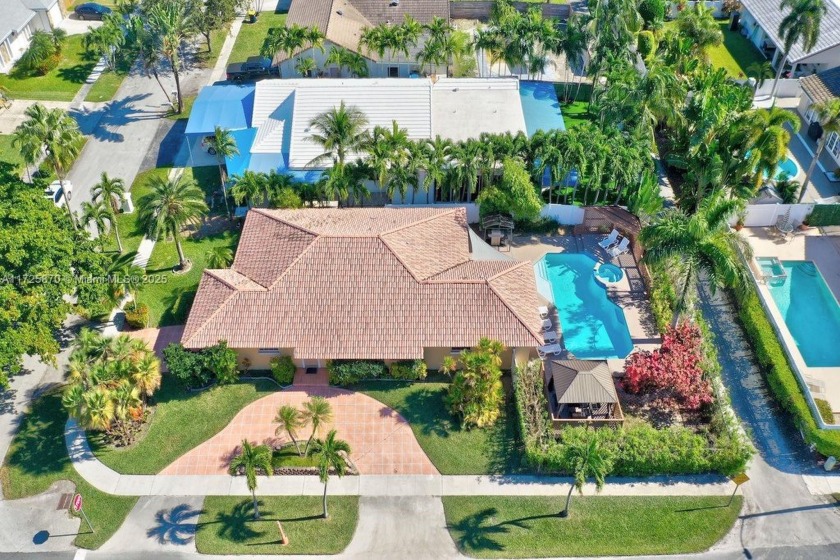 Stunning corner-lot home located in the most upscale part of - Beach Home for sale in Dania, Florida on Beachhouse.com