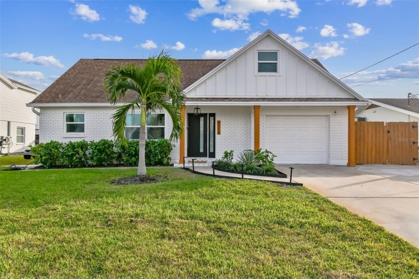 Welcome to your sanctuary by the water's edge! Nestled in the - Beach Home for sale in Tampa, Florida on Beachhouse.com