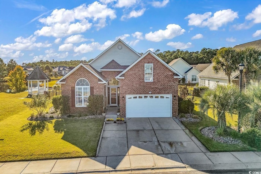 Located in the much-desired gated neighborhood of Surfside Beach - Beach Home for sale in Surfside Beach, South Carolina on Beachhouse.com