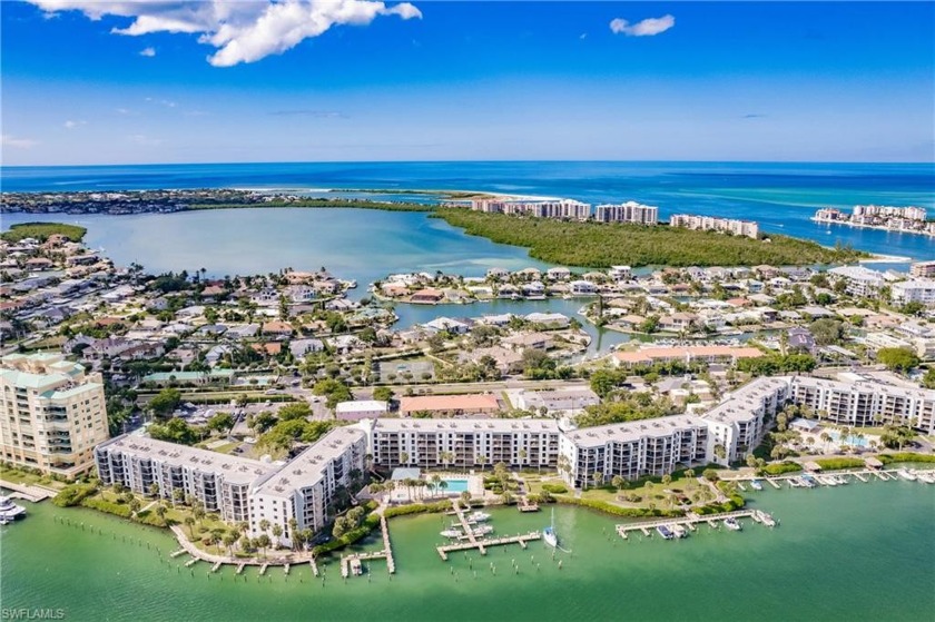 This beautiful condo is a rarely available end unit, offering - Beach Condo for sale in Marco Island, Florida on Beachhouse.com
