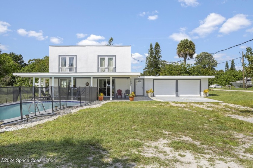 Nestled in the town of Malabar, this beautifully updated, pool - Beach Home for sale in Malabar, Florida on Beachhouse.com