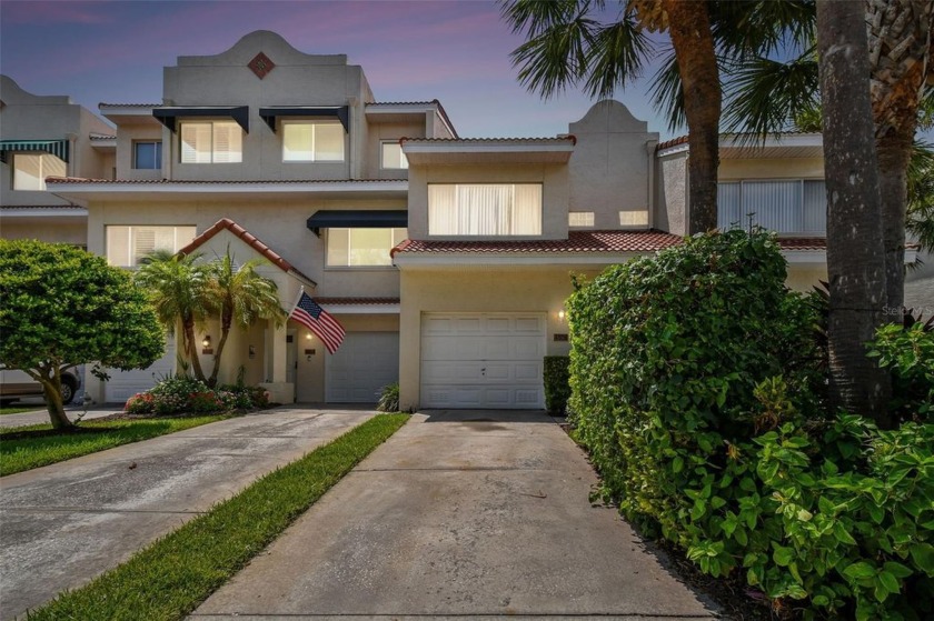 Nestled along the tranquil shores of Boca Ciega Bay and just - Beach Townhome/Townhouse for sale in ST Pete Beach, Florida on Beachhouse.com