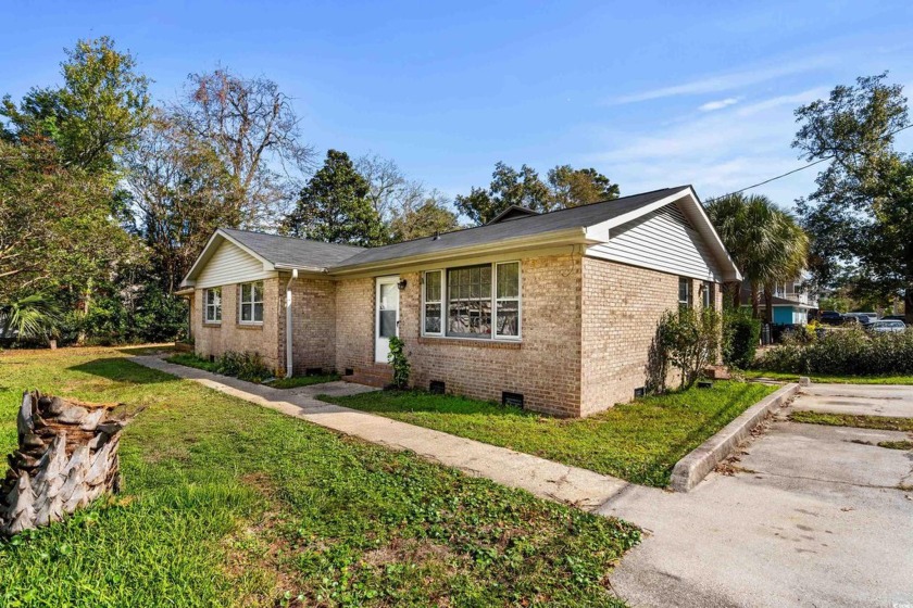 This fantastic duplex is ideally located within walking distance - Beach Townhome/Townhouse for sale in Surfside Beach, South Carolina on Beachhouse.com