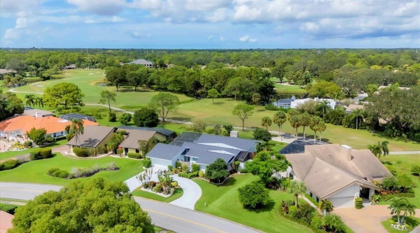 Experience serene golf course views from this beautifully - Beach Home for sale in Sarasota, Florida on Beachhouse.com