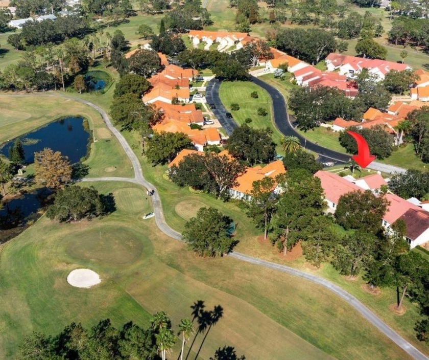 You must see this gracious Golf View Villa home in Highland - Beach Home for sale in Palm Harbor, Florida on Beachhouse.com