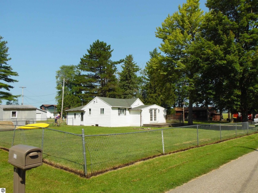 Located across the street from Tawas Lake and a short drive to - Beach Home for sale in East Tawas, Michigan on Beachhouse.com