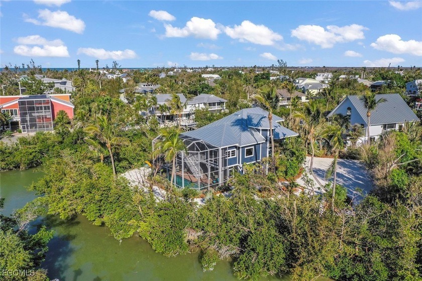 Welcome to Hidden Harbour! This lovely island retreat is located - Beach Home for sale in Sanibel, Florida on Beachhouse.com