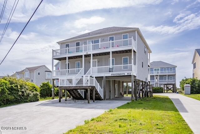 Experience the joys of beachfront living with this stunning and - Beach Home for sale in Surf City, North Carolina on Beachhouse.com