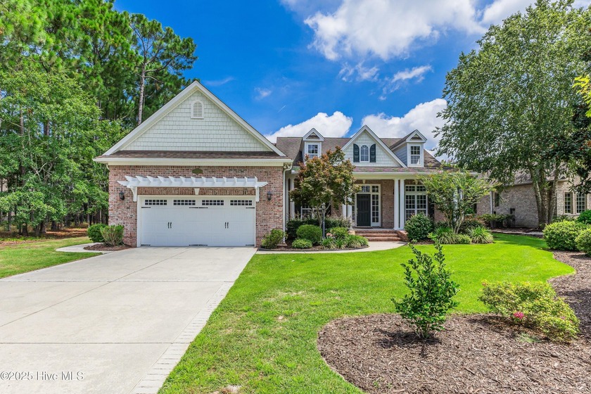 This elegant all-brick, one-level home is perfectly situated in - Beach Home for sale in Southport, North Carolina on Beachhouse.com