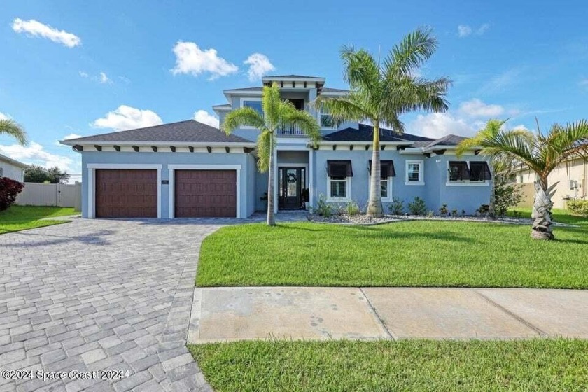 Brand new roof October 2024. This custom ''solar'' home, built - Beach Home for sale in West Melbourne, Florida on Beachhouse.com