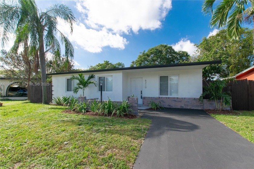 Welcome to this spacious and inviting 4-bedroom, 2-bath home - Beach Home for sale in North Lauderdale, Florida on Beachhouse.com