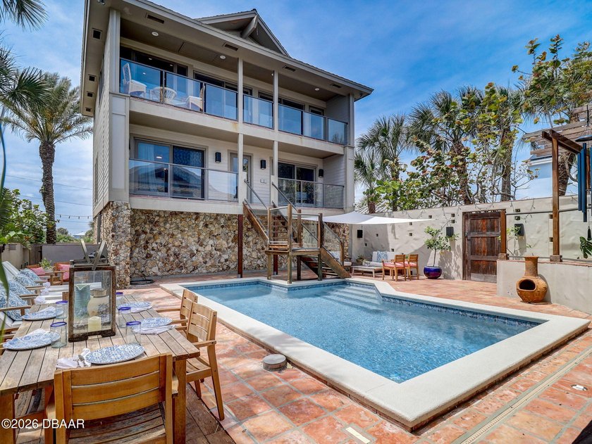 Experience coastal luxury at ''Pura Vida,'' a Costa - Beach Home for sale in New Smyrna Beach, Florida on Beachhouse.com