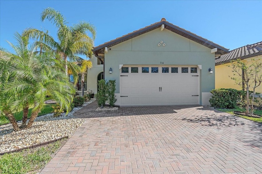 Serene WATERFRONT LIVING in Sanctuary Cove! Welcome to this - Beach Home for sale in Palmetto, Florida on Beachhouse.com