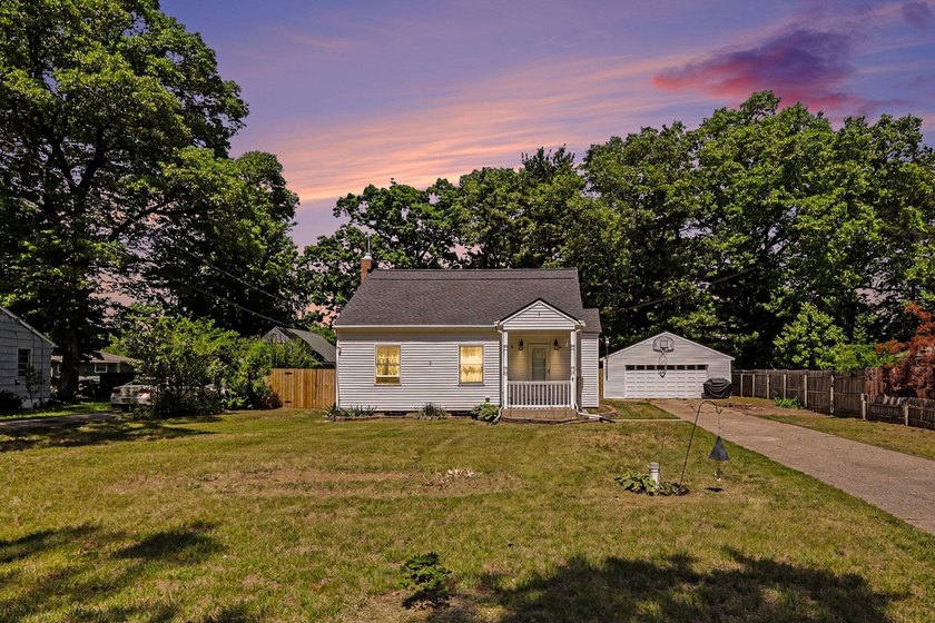 Tucked away on a quiet street, this charming 4-bedroom, 2-bath - Beach Home for sale in Muskegon, Michigan on Beachhouse.com