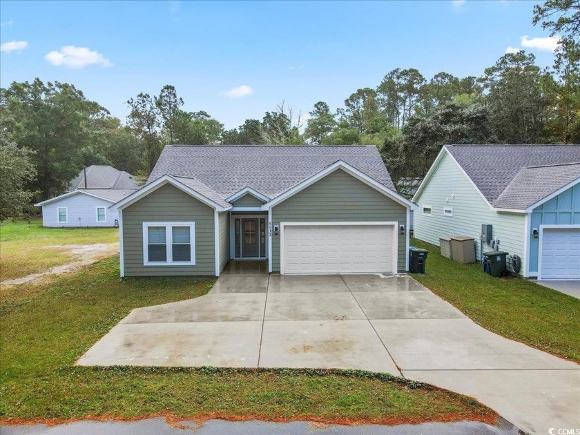 This cottage style home offers three bedrooms and two fully - Beach Home for sale in North Myrtle Beach, South Carolina on Beachhouse.com