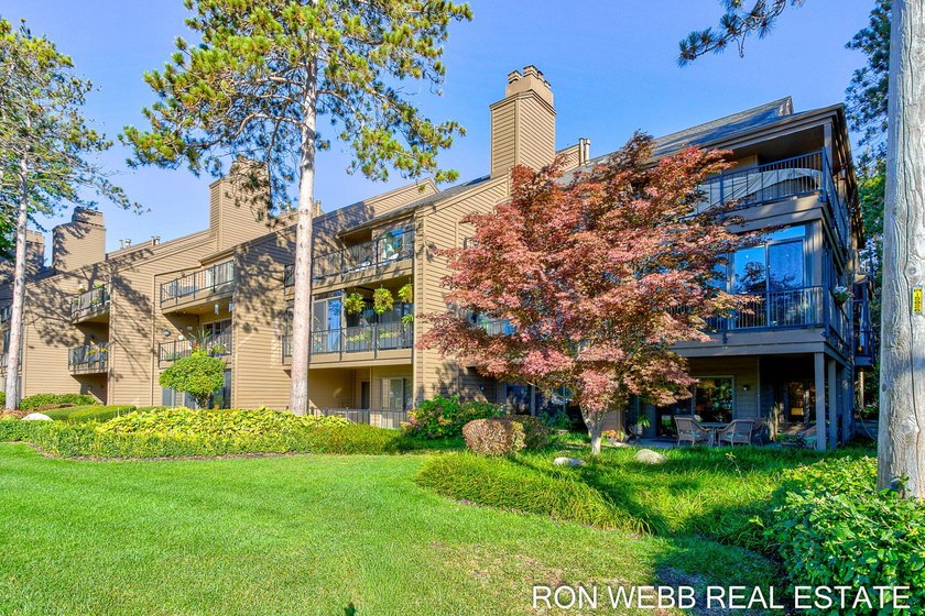Rare End-Unit Condo with Lake Views, Marina Access & Designer - Beach Condo for sale in Holland, Michigan on Beachhouse.com