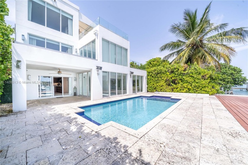 A modern and impressive bay front  house in the prestigious Palm - Beach Home for sale in Miami Beach, Florida on Beachhouse.com